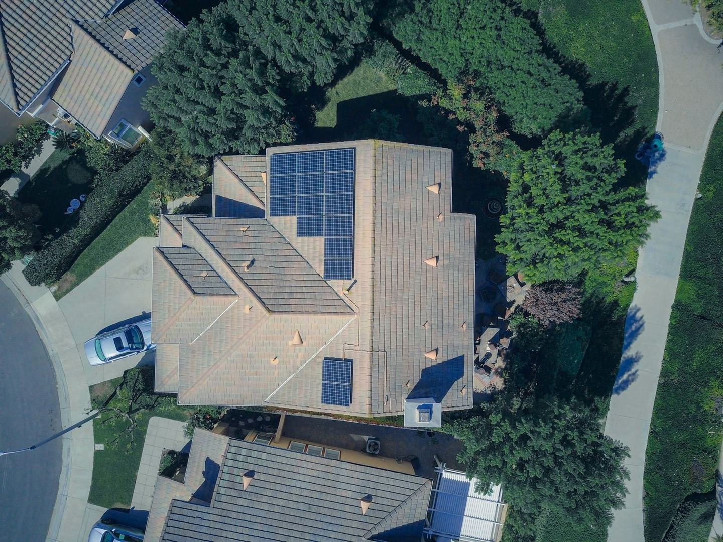 Aerial view of a Southern California home with a large rooftop solar panel array
